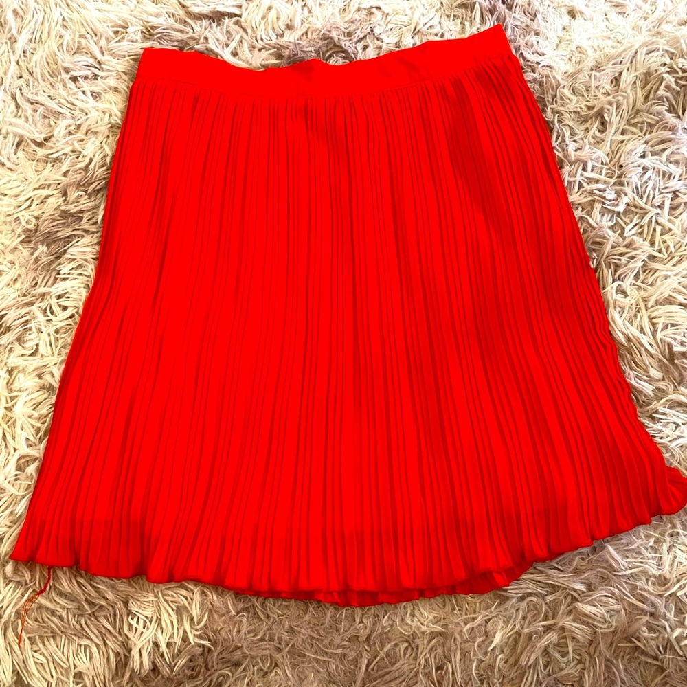 Bright red ruffled skirt